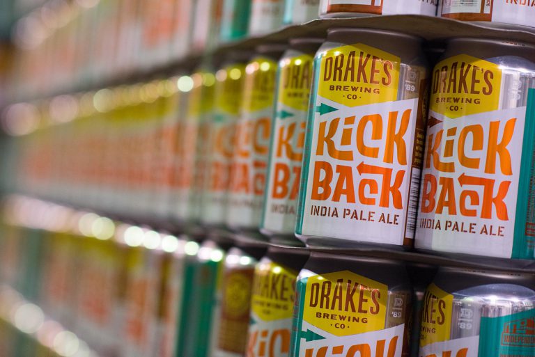 A pallet of empty Kick Back IPA cans