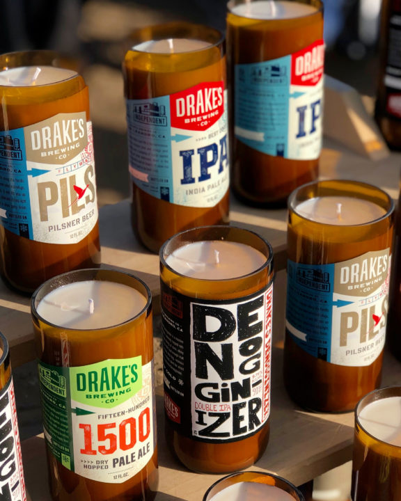 Drake's Beer labels on handcrafted candles at Crafts and Drafts