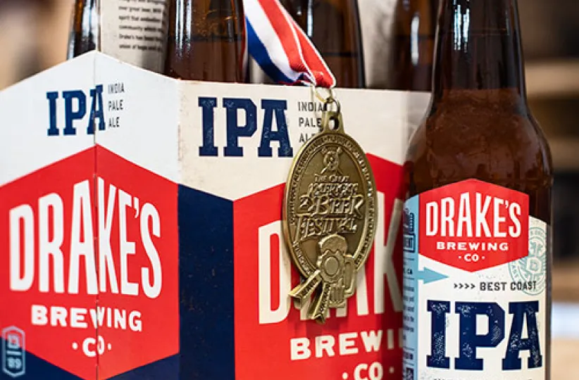 Drake's Brewing Co. IPA beer carrier with award medal